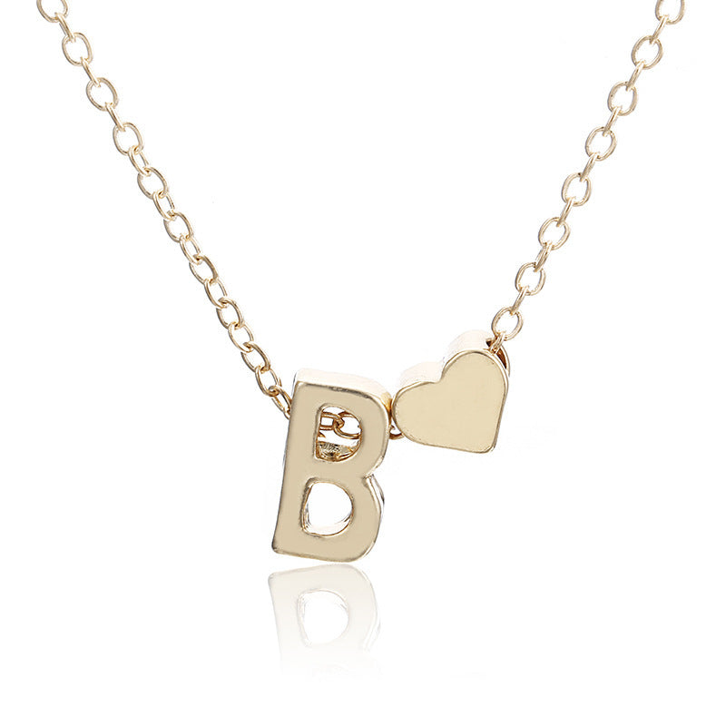 LANZA NECKLACE 
Heart Shaped Letter Necklace