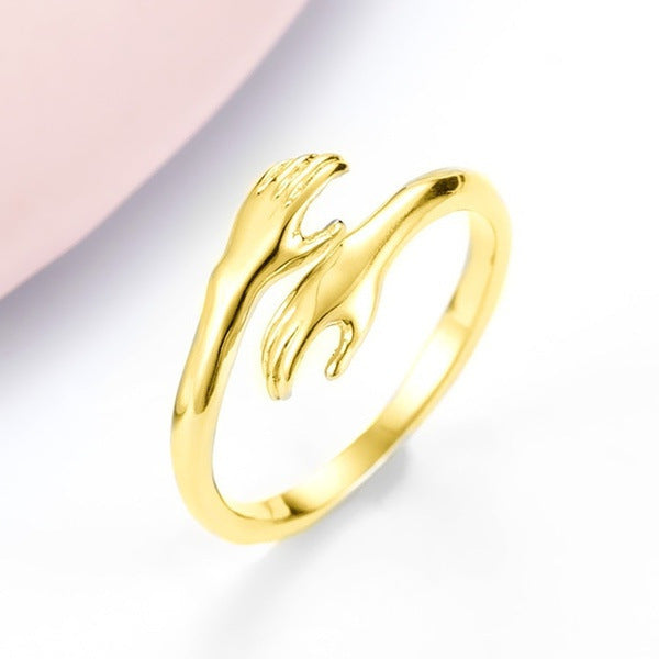 LANZA RINGS 
Alloy Simple Hands Hug ring