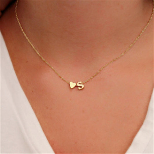 LANZA NECKLACE 
Heart Shaped Letter Necklace