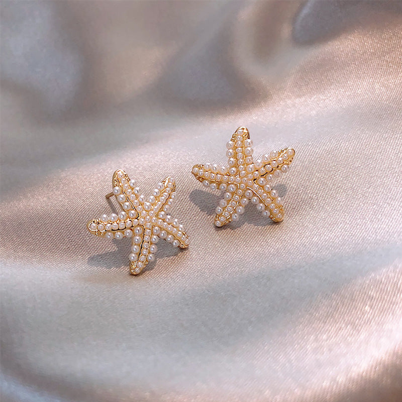 LANZA EARINGS 
Pineapple Starfish Pearl Earrings