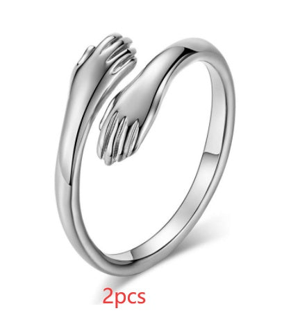 LANZA RINGS 
Alloy Simple Hands Hug ring